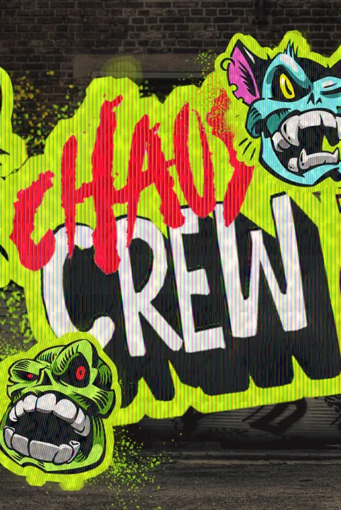 Graffiti art on a brick wall featuring the text 'Chaos Crew' and two cartoonish monster heads.